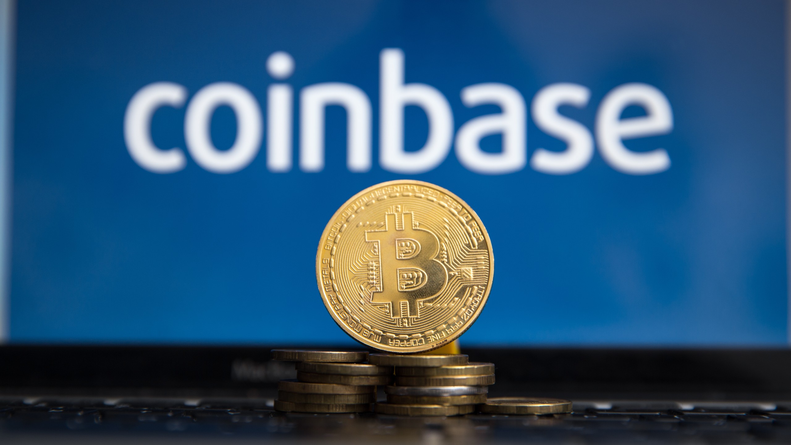 Coinbase Stocks Soar as Cathie Wood's Investment Firm Cashes In